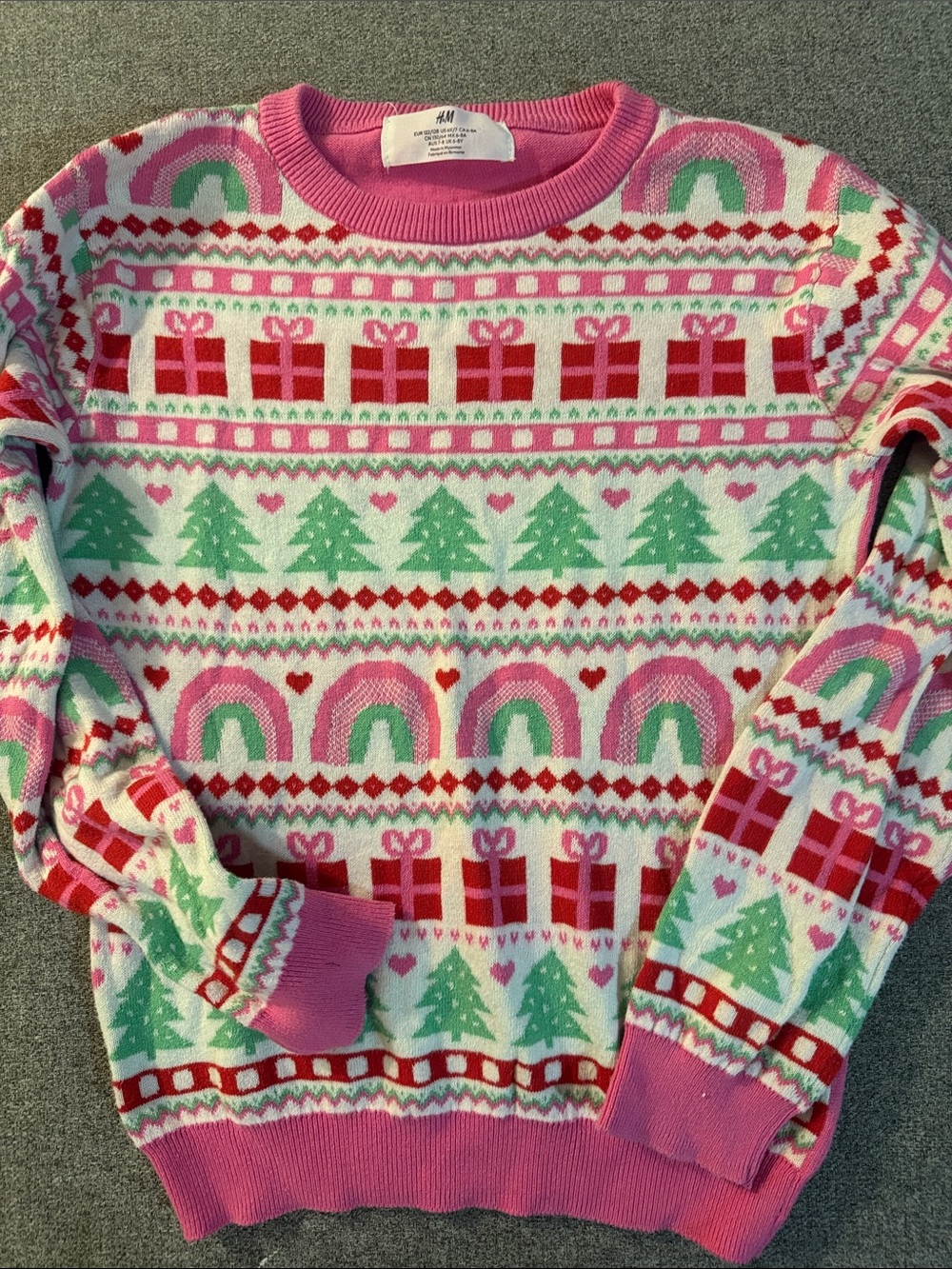 5/$15- H&M Pink Holiday Sweater with Green Trees & Red Gift Motifs